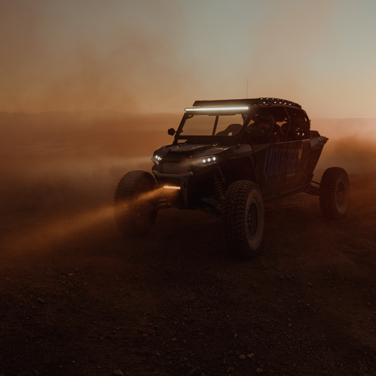 amber 10 inch led light bar mounted on a polaris rzr