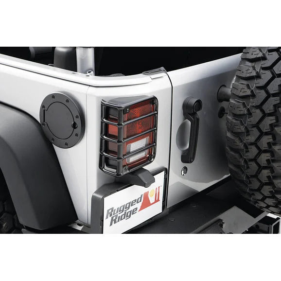 Load image into Gallery viewer, Rugged Ridge Stainless Steel Fuel Door for 07-18 Jeep Wrangler JK
