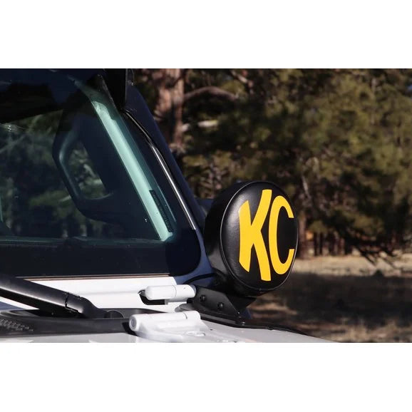 Load image into Gallery viewer, KC HiLiTES 5102 6&quot; Vinyl Covers in Black with Yellow KC Logo
