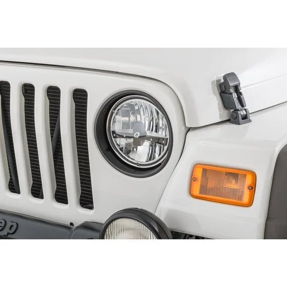 Load image into Gallery viewer, Rugged Ridge 12419.23 Headlamp Bezels in Black for 97-06 Jeep Wrangler TJ &amp; Unlimited
