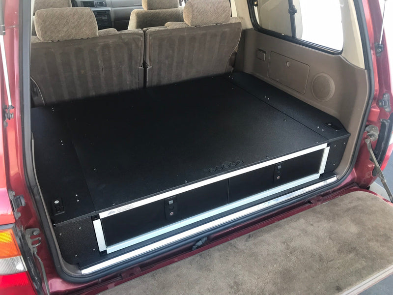 Load image into Gallery viewer, Goose Gear Stealth Sleep and Storage Packaged for Toyota Land Cruiser 1991-1997 80 Series - 43-3/8&quot; W x 8&quot; H x 40&quot; D

