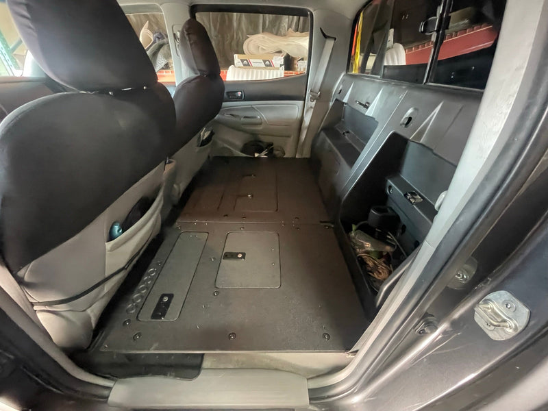 Load image into Gallery viewer, Goose Gear Toyota Tacoma 2005-Present 2nd and 3rd Gen. Double Cab - Second Row Seat Delete Plate System keeping Factory Back Wall
